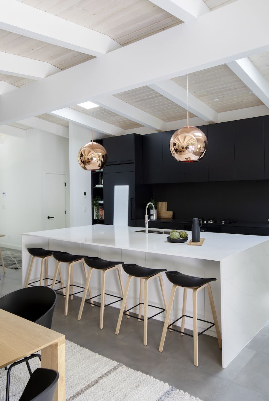 Edgemont midcentury home renovation kitchen tom dixon pendants