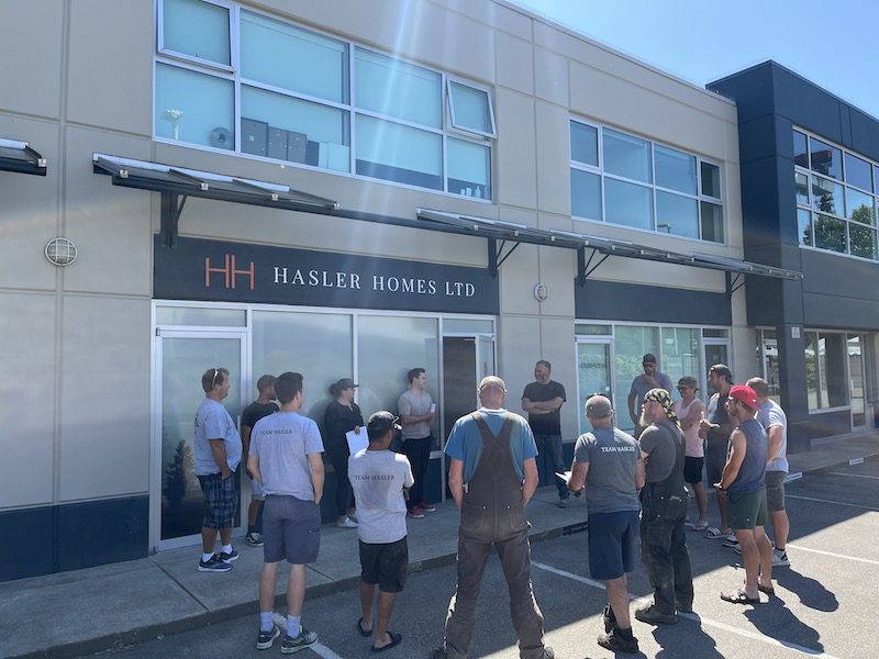 Team meeting outside Hasler Homes office in North Vancouver