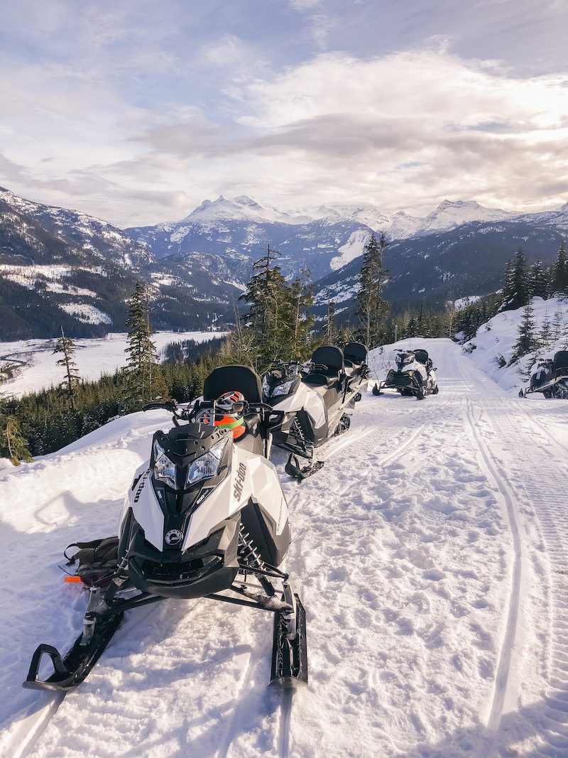 Hasler Homes team snowmobiling during team building day at Whistler