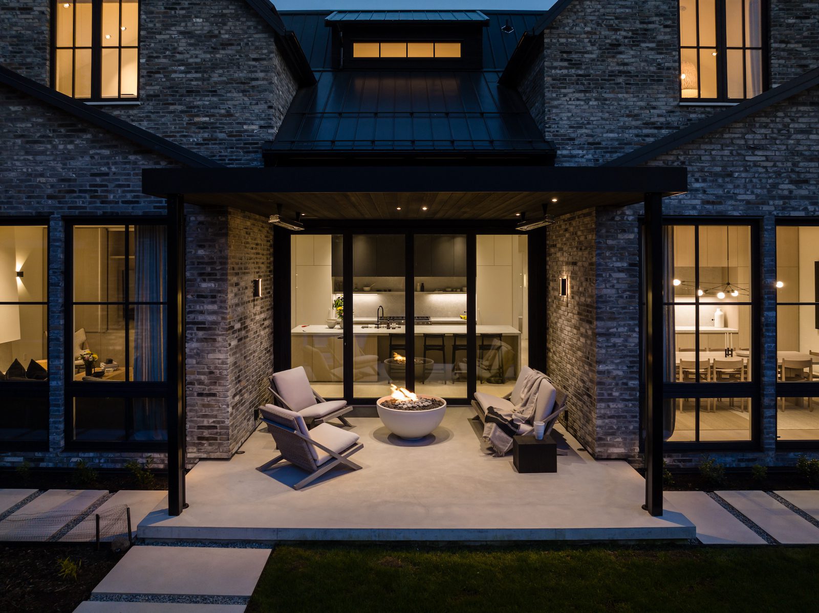 Scandia North Van Custom Home Exterior Firepit Twilight 