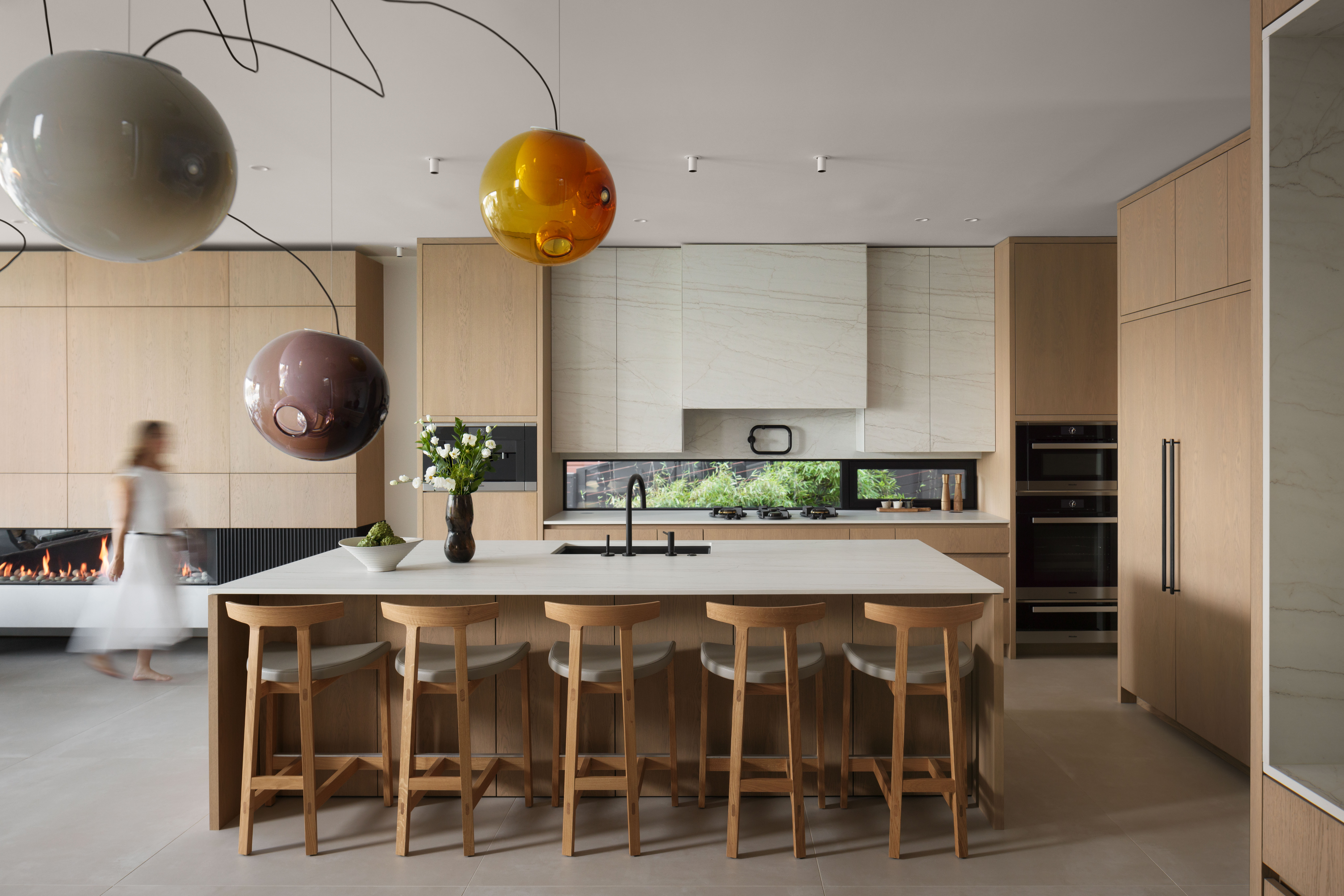Modern kitchen in a custom Deep Cove home built by Hasler Homes