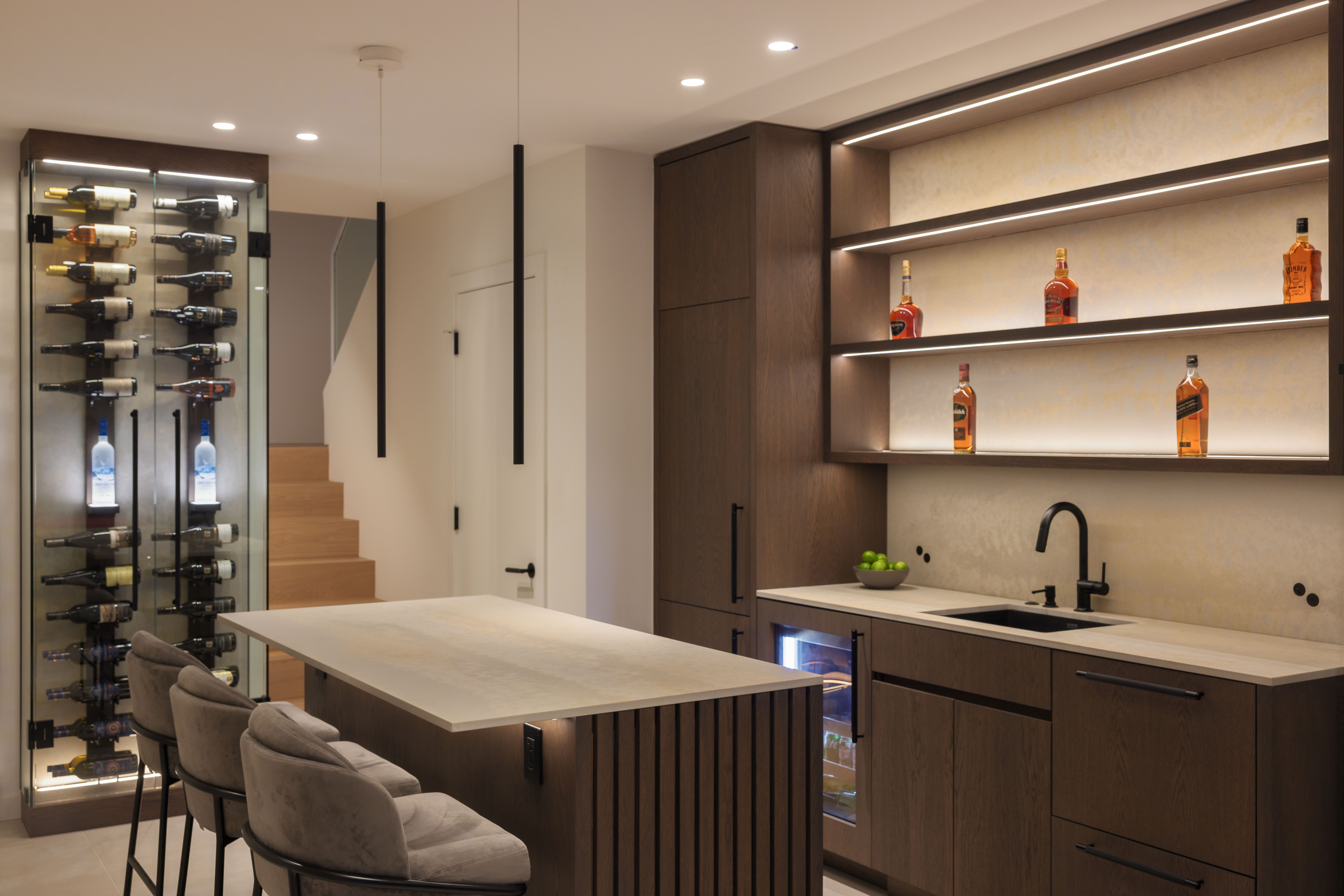 Fala custom home bar with wine storage and custom cabinetry